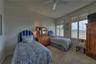 Guest bedroom with armoire closet