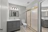 Ensuite bathroom in the primary bedroom.