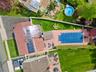 View from above of property featuring a pool
