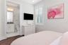 Third floor secondary bedroom and en suite bathroom