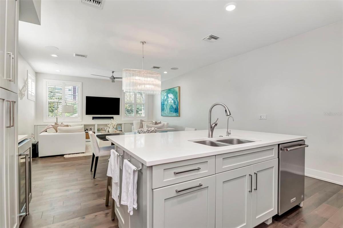 Kitchen facing dining and  living space