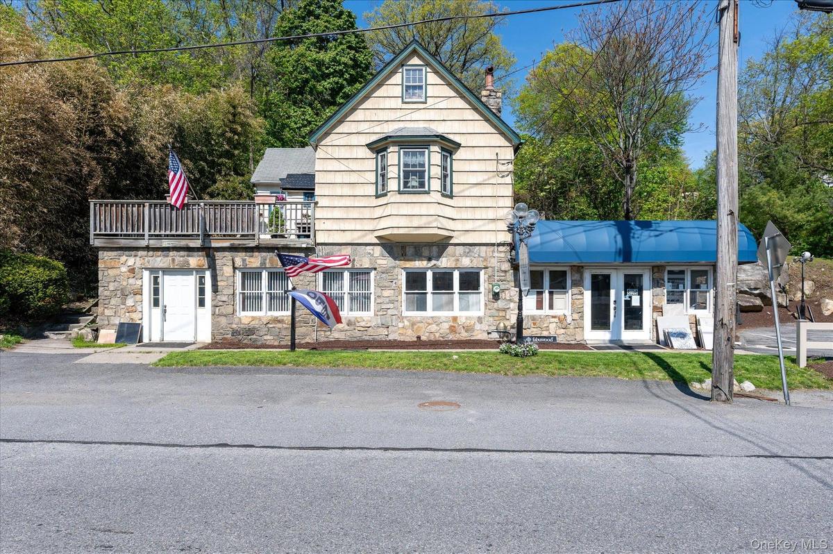 544 Route 6, Mahopac, NY — stone exterior, commercial entry, residential deck above