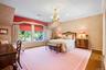 En-suite bedroom with brand new bathroom, California closet and views of the lush back garden