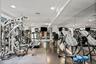 Large fitness room with a full bathroom