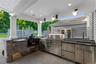 State-of-the-Art outdoor kitchen with ice maker, dishwasher and fridge