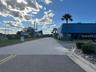 View of driveway to all the units, enough space for trucks and equipments to unload.