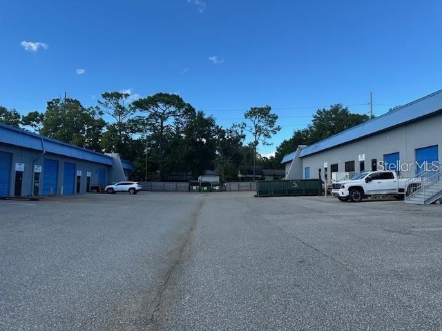 View of commercial units loading docks and parking spaces.