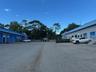 View of commercial units loading docks and parking spaces.
