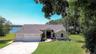 Tranquil Lakefront Setting with Mature Trees