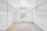 Primary Bedroom Walk In Closet