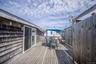 Deck Area with Outdoor Shower / Entrance to Apartment