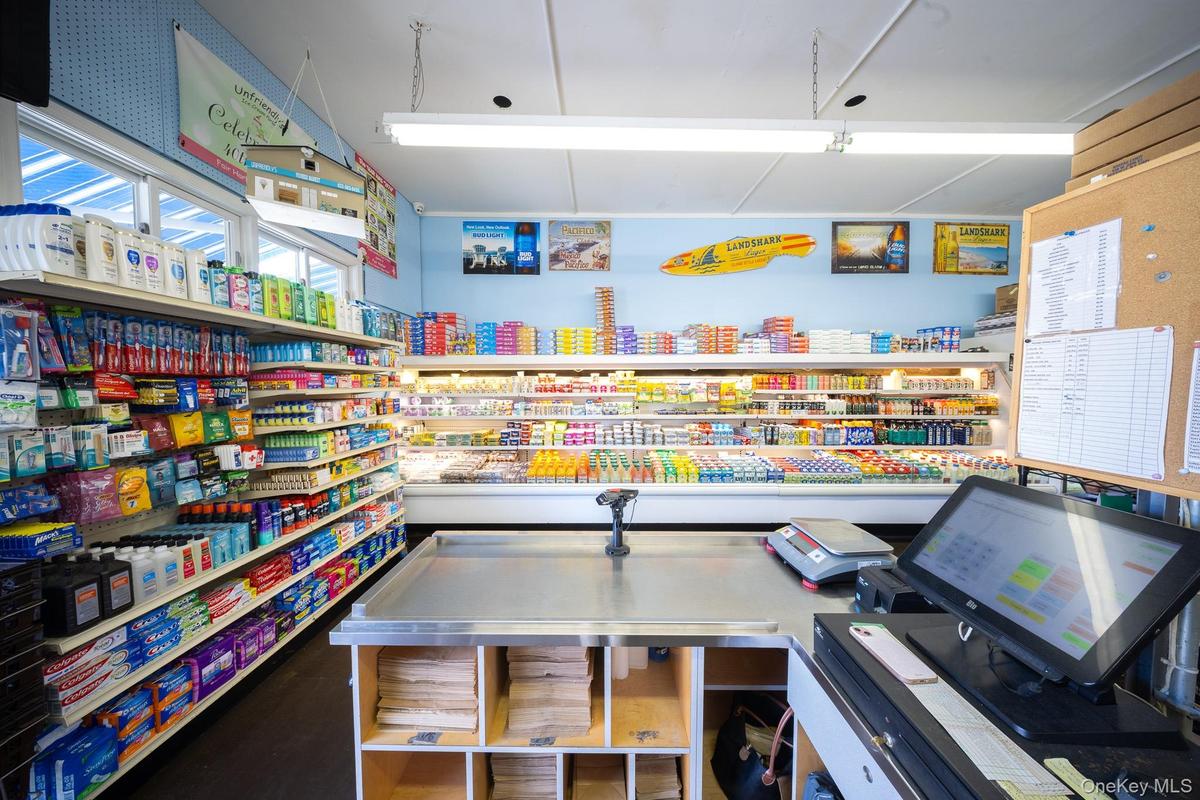 Register Area looking at Dairy Case