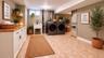 virtually staged basement to show laundry room potential