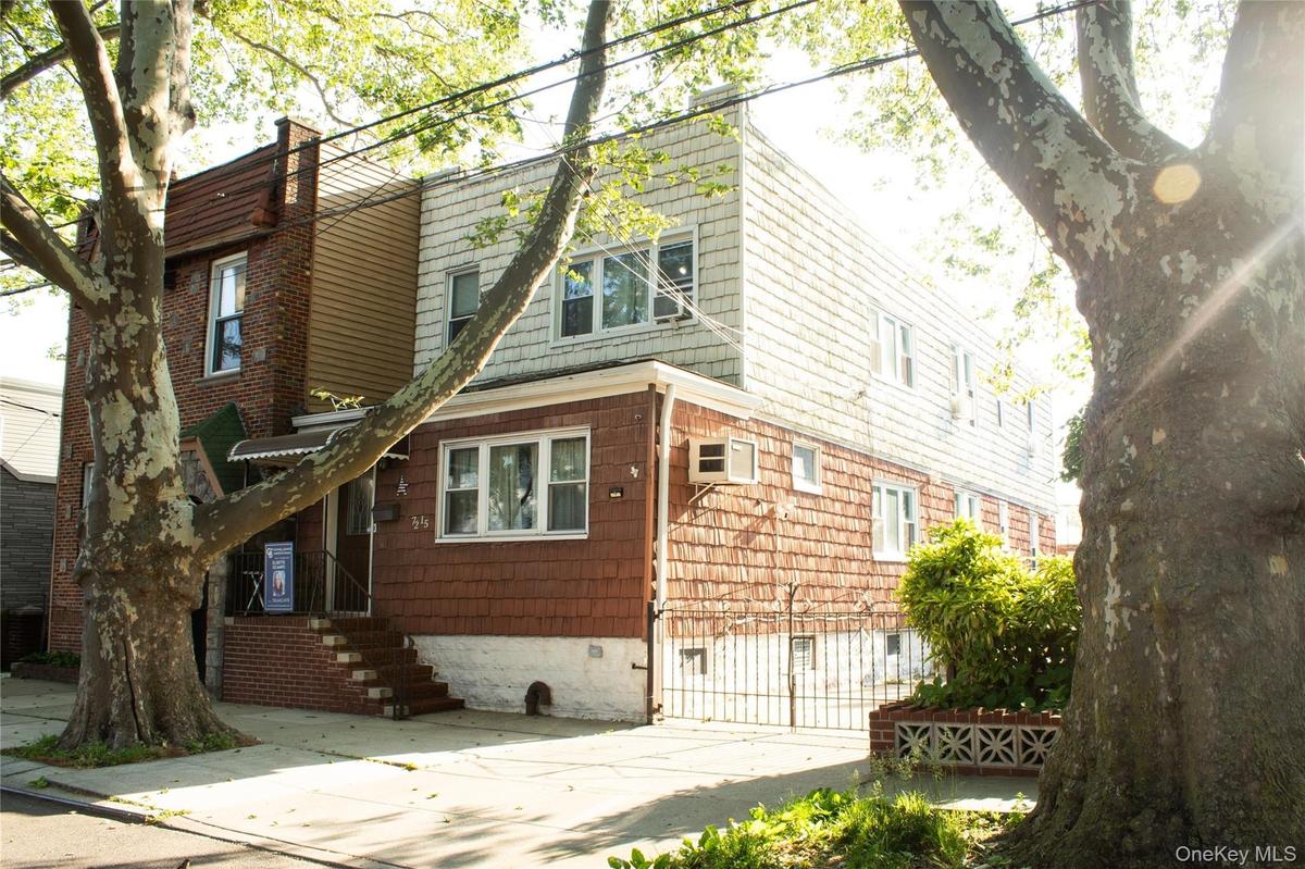 Legal 2 Family ,2 Car Garage Detached, Private Driveway, sits on 25 x 100.83, Taxes Low 9313.72 (Block 3696 Lot#83)Sale includes Vacant Land /adjacent