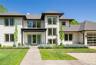 Contemporary architecture with white horizontal siding and black trim accents