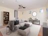 2nd level - Virtually staged expansive 20x20 family room offering exceptional flexibility for entertaining, movie nights, or comfortable everyday livi