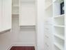 3rd level - walk in closet with California Closet system.