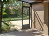 Rear exit from lanai to access additional garage