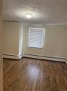 The second upstairs bedroom that has a huge walk in room attached that can be a closet, office, or exercise room.