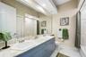 Third bathroom with tub located upstairs