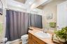 Fourth bathroom with tub located upstairs