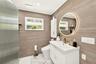 Primary in suite bathroom with Toto Bidet and a vanity that stores everything!