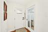 Back door to porch and entrance to Laundry Room