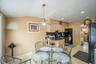 Dining room featuring baseboards and recessed lighting