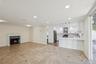 Open-concept living space featuring a dining area, kitchen, and living room