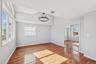 Second Floor Primary Bedroom with full en-suite and large closets with custom cabinets