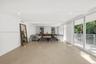 LIVINGROOM OPENS TO SPACIOUS TERRACE