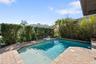 Outside, there is a pool