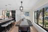 Dining space adjacent to the kitchen allows for larger gatherings