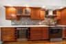 Fine finishes found throughout the kitchen with high-end appliances & custom cabinetry.