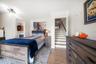 Easy interior access from main level to bonus room with ensuite bath on ground level