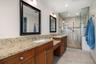 Walk in shower in primary bath area.