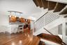 Modern finishes are found throughout include attractive staircase railings and bamboo flooring.
