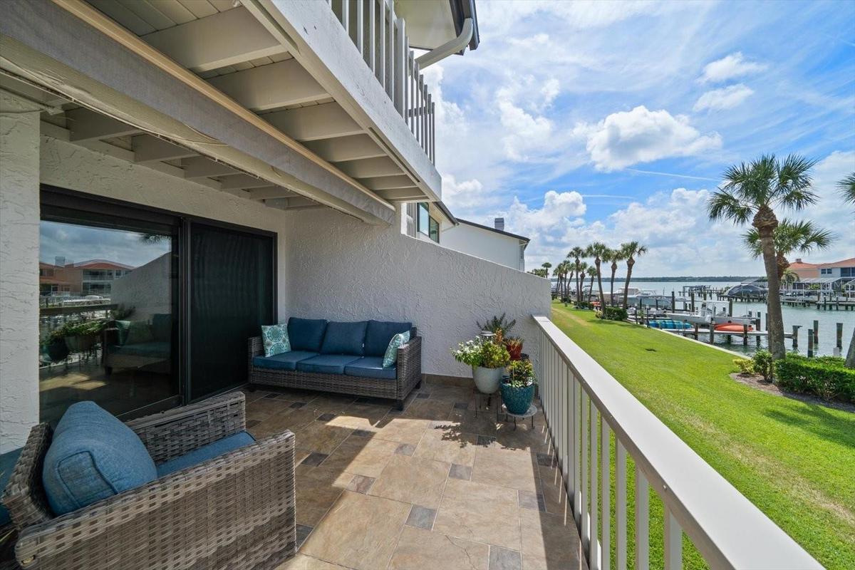 Private terrace found off the main level creates an inviting outdoor living space.