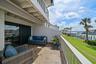 Private terrace found off the main level creates an inviting outdoor living space.
