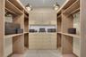 primary suite: closet and bath 1