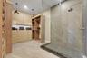 primary suite: closet and bath 1