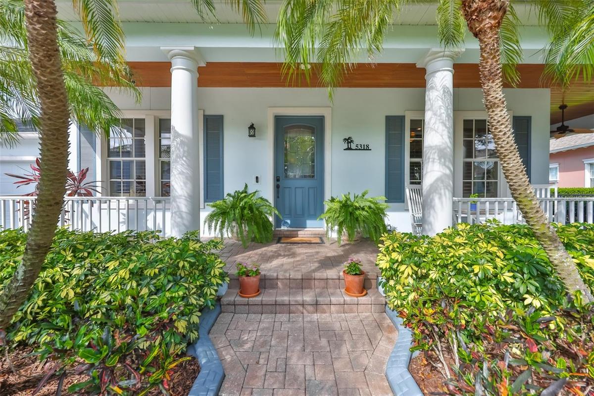 Welcoming Southern-style wrap around porch