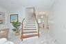 highly-polished wood floor staircase