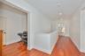 upstairs hallway/solid stairway sides