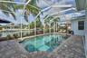 newly sealed pavers in lanai pool deck