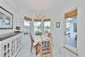 breakfast room/nook with view of backyard and canal