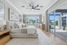 Primary Suite has Sliding Glass Doors and Bay Views