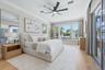 Primary Suit Bedroom has Sliding Glass Doors and Bay Views
