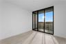 Third bedroom with balcony, southwestern views and ensuite bathroom