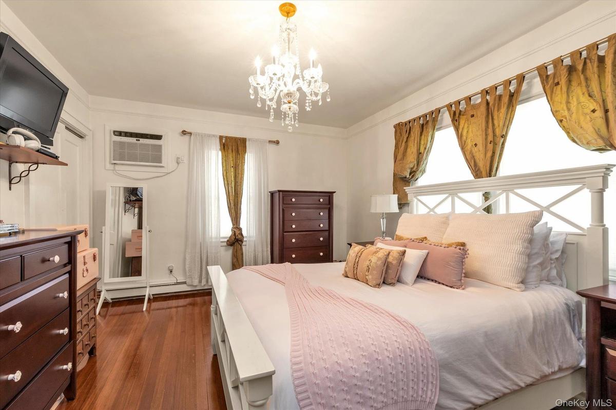 Primary Bedroom with Hardwood Floors